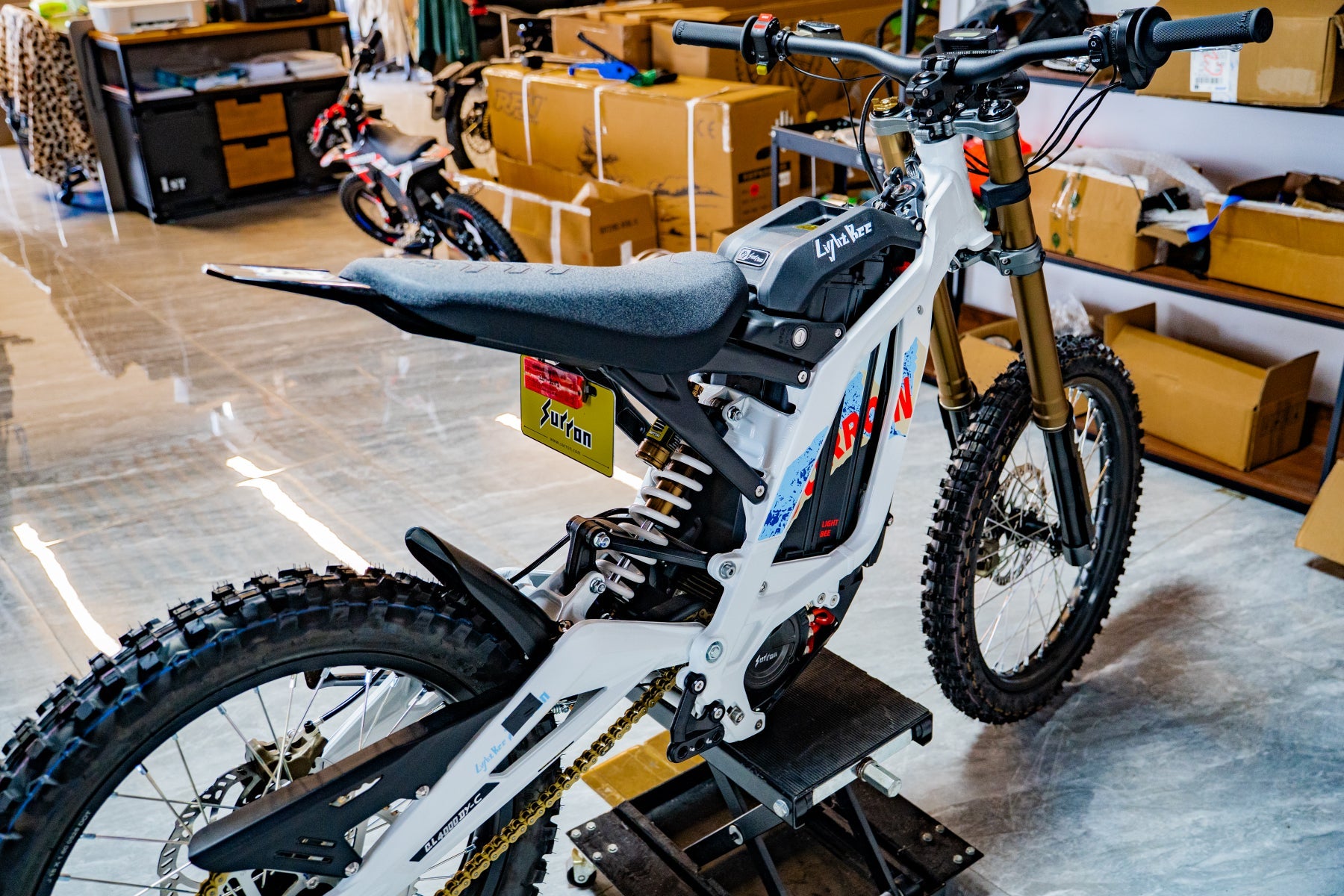 SURRON Light Bee X 2026 electric dirt bike in white, front angle view