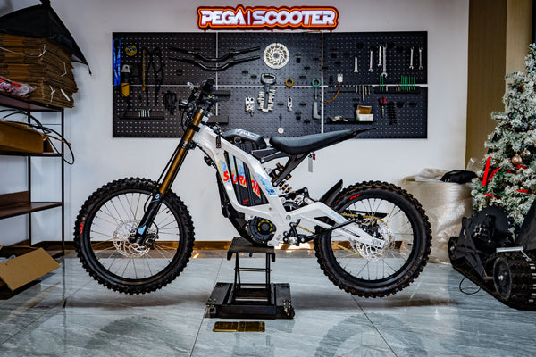 SURRON Light Bee X 2026 electric dirt bike in white, showroom display