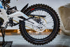 SURRON Light Bee X 2026 electric dirt bike in white, angled side view