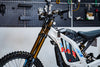 SURRON Light Bee X 2026 electric dirt bike in white, rear angle view