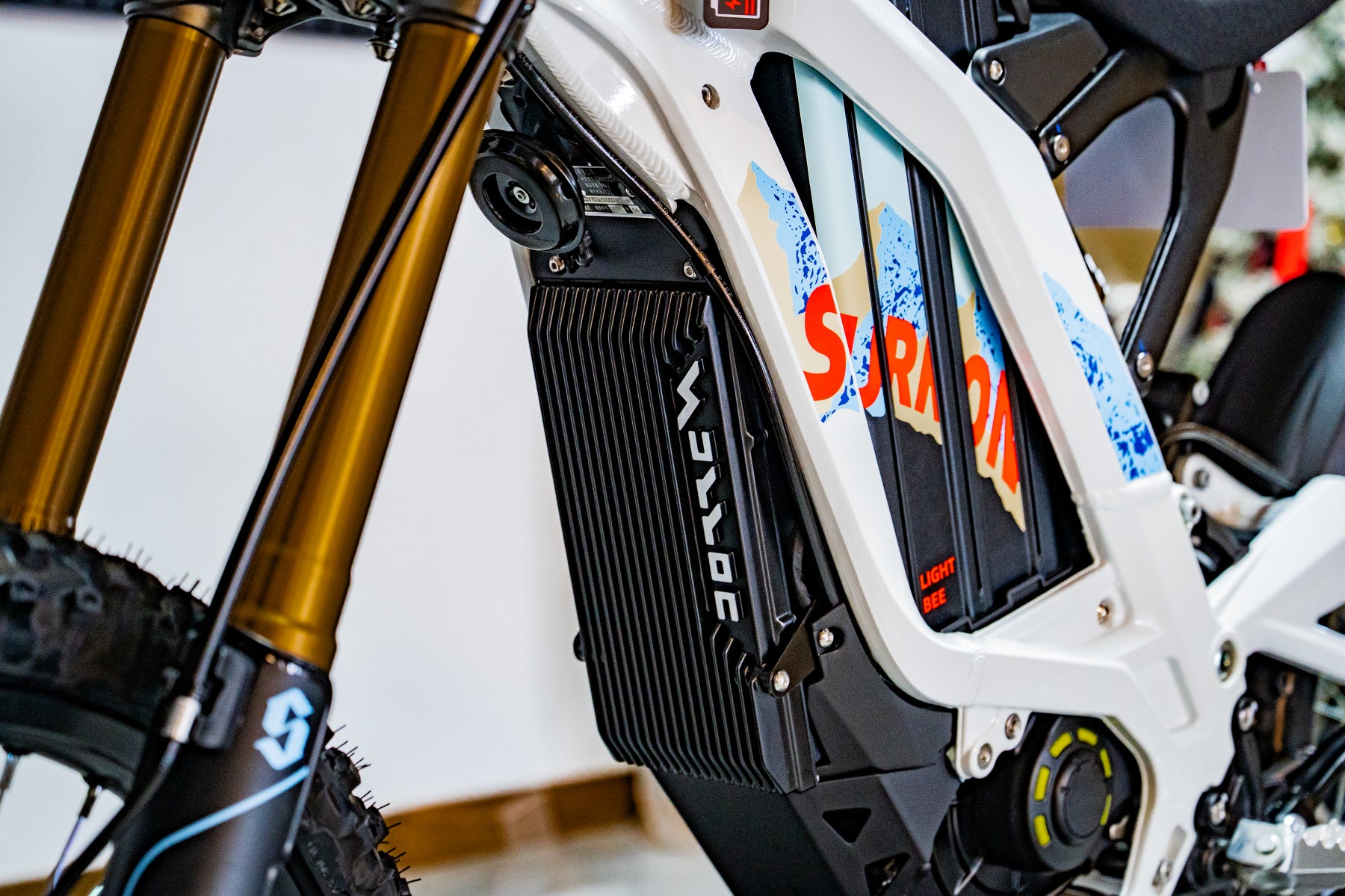 SURRON Light Bee X 2026 electric dirt bike in white, handlebar and cockpit detail